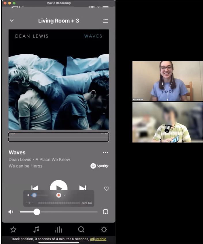This image shows an interviewer speaking with a participant, who is demonstrating how they use the VoiceOver screen reader.